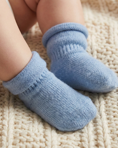 Baby merino wool socks in cloudy blue, soft breathable knit booties for newborn warmth and temperature regulation