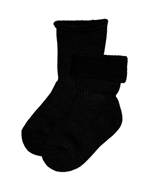 The Kids' Merino Sherpa Lined TWO Socks in color black, one rolled down, revealing the sherpa lining, and the other fully rolled up.