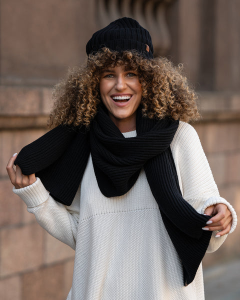 Women's Ribbed Beanie Knitted Merino in black color.