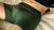 Breathable Merino wool men‘s underwear boxer featuring dark green color. 