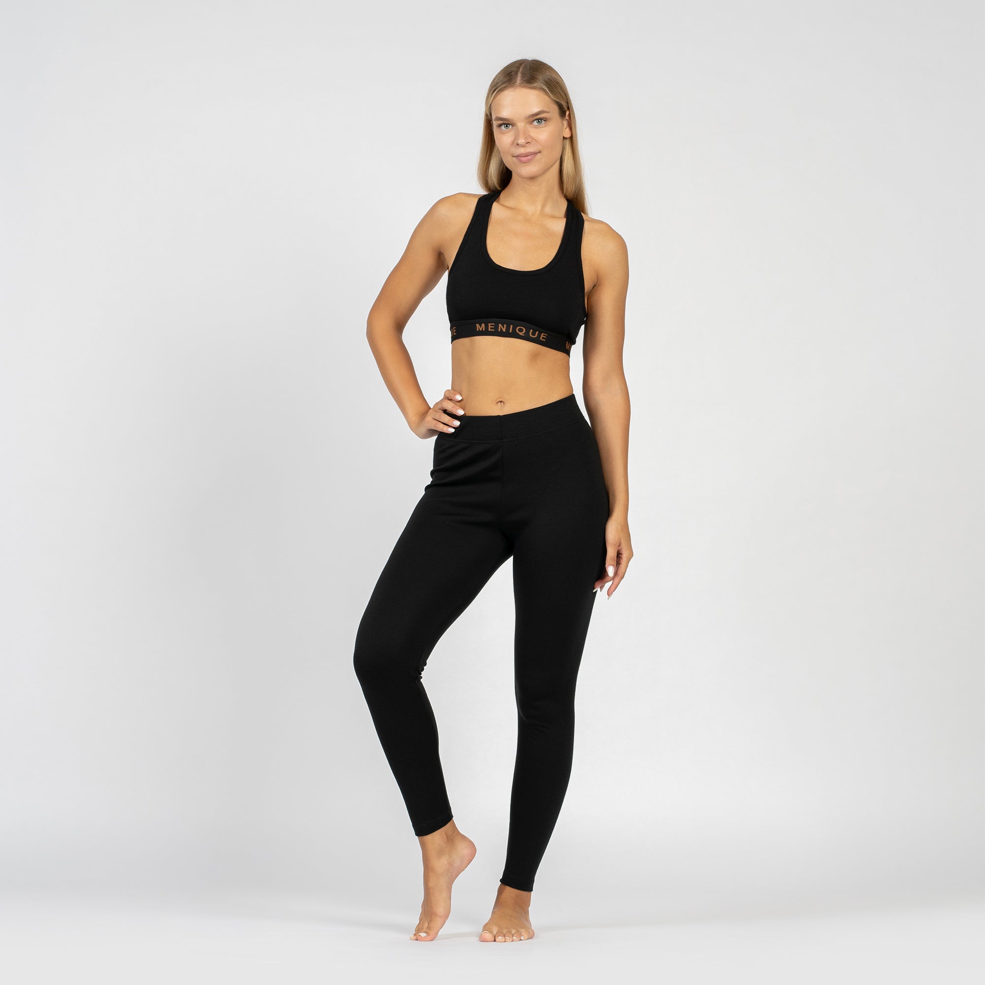 The menique women's merino wool sport bra in 160gsm and leggings in 250gsm fabric, royal cherry color.