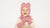 Little girl smiling and wearing dusty pink merino wool balaclava with ears and gloves