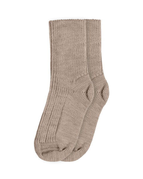 The Menique Kids&#39; Merino Rib Thick Socks in color beige.