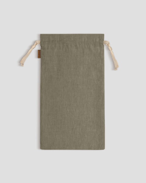 Stone Green drawstring bag on a light gray background