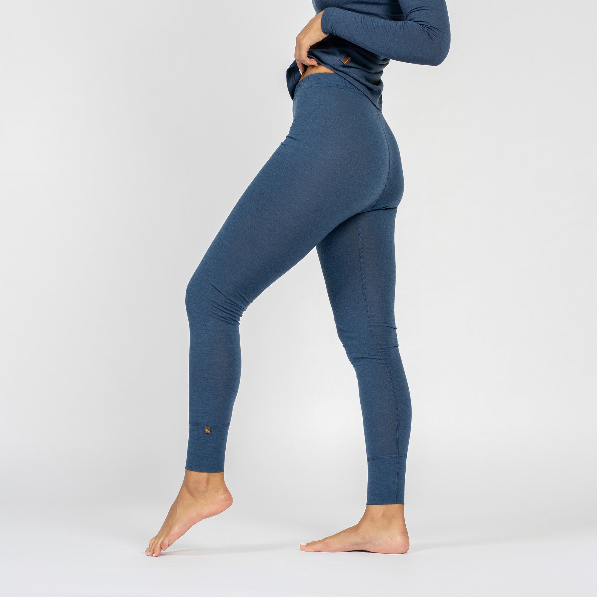 Women’s denim blue merino wool long sleeve top and leggings set.