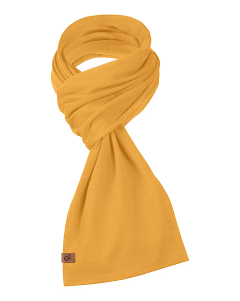 Long yellow merino wool scarf isolated on white background, breathable natural wool accessory for men and women.