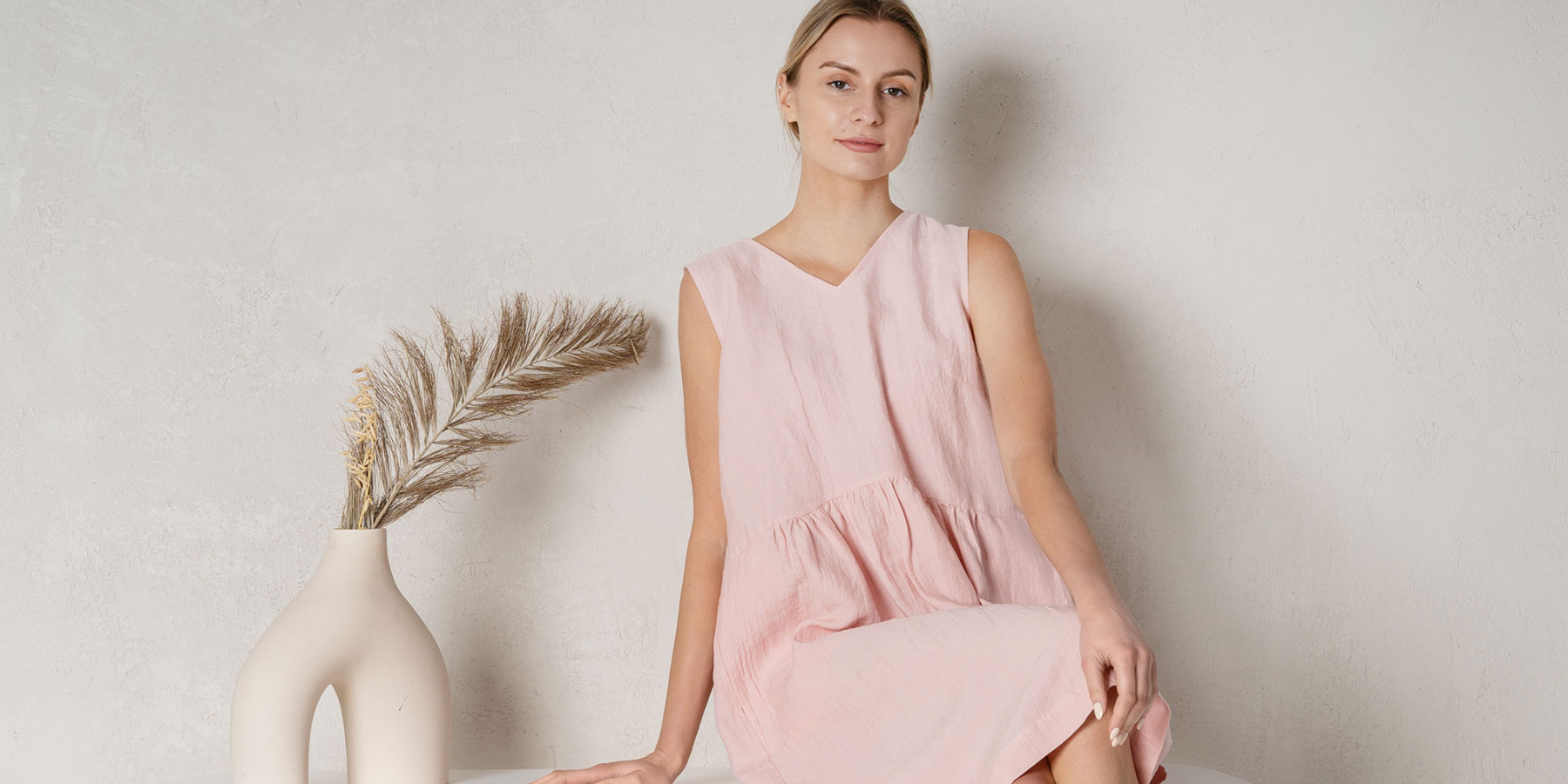 Woman wearing dusty pink Linen dress - sustainable gifts for women