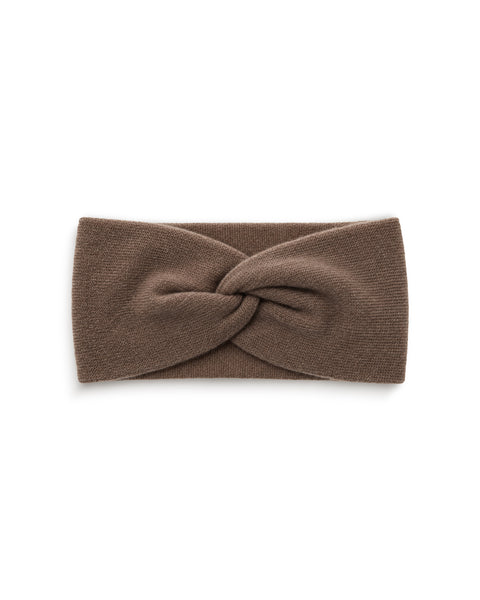 A brown knit headband featuring a twisted knot design in the center, displayed flat against a plain white background.