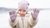 Girl outdoors wearing dust pink knitted merino wool gloves and beanie