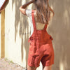 Menique Linen romper Nino in cinnamon red color matched with merino wool natural short sleeve top