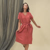 Woman wearing linen dress in moroccan red color video