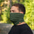 menique unisex dark green neck gaiter in a white background.